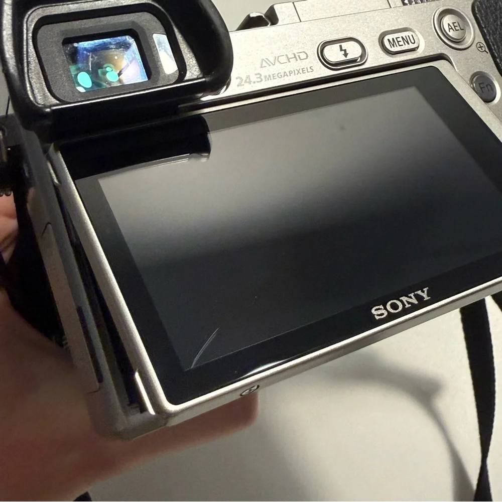 Sony a6000 - 24.3 MP Mirrorless Camera Body & 55‑210mm OSS Lens - Silver